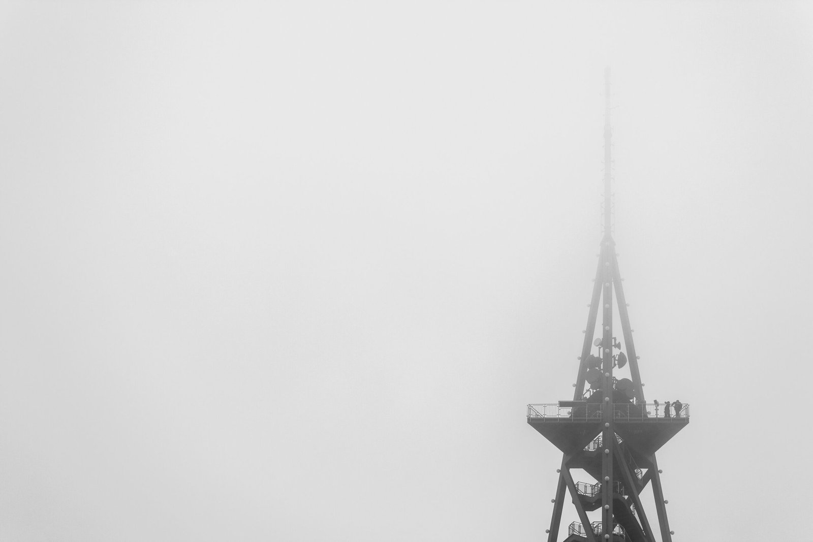 black metal tower under white sky
